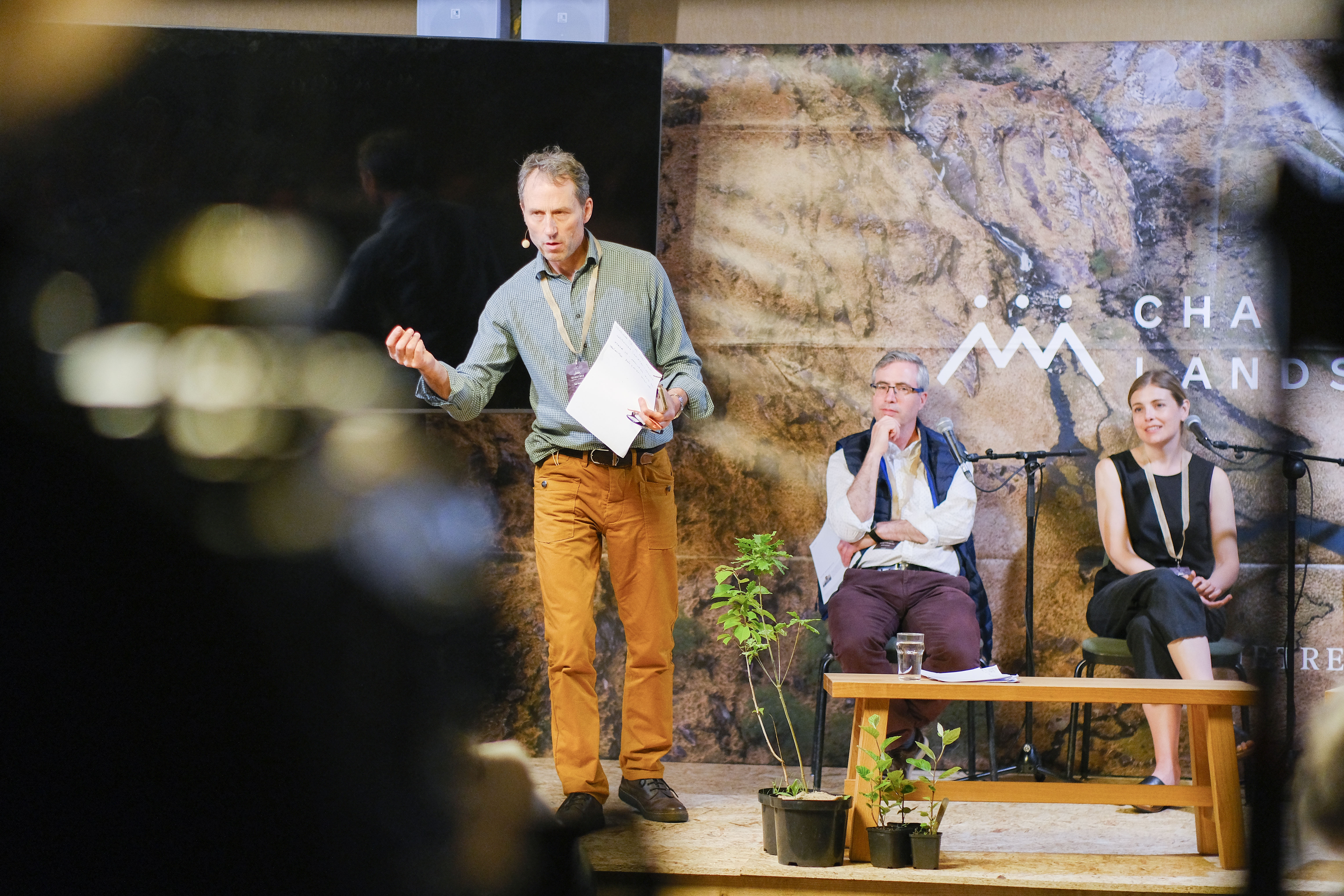 Rob Yorke on stage at an event speaking to audience 